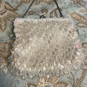 Elegant pearl tone clutch